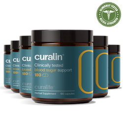 A bottle of CurLife Blood Sugar Support capsules next to a variety of natural ingredients.