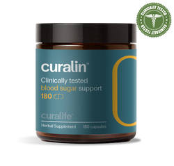A bottle of CurLife Blood Sugar Support capsules next to a variety of natural ingredients.
